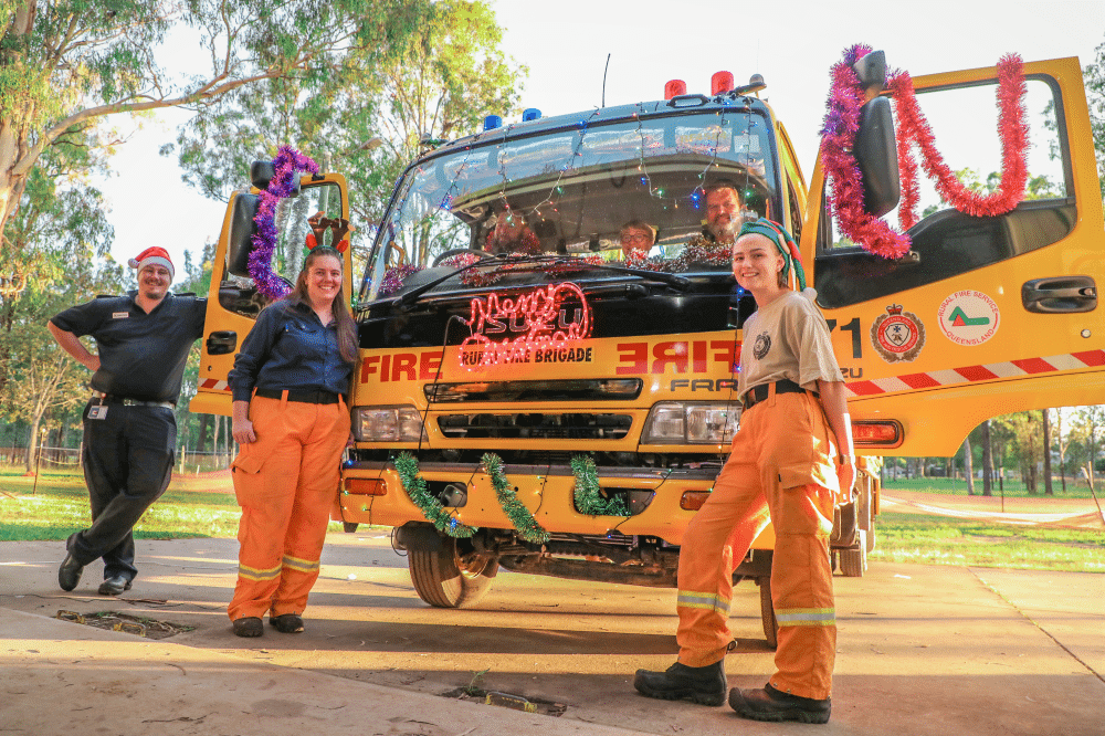 IF Mt Forbes Rural Fire Service Santa on Tour L to R Captain David Clarke Stacey Haskell David Bailey Kerri Clarke Frank Stephen Stewart and Alysha Witt