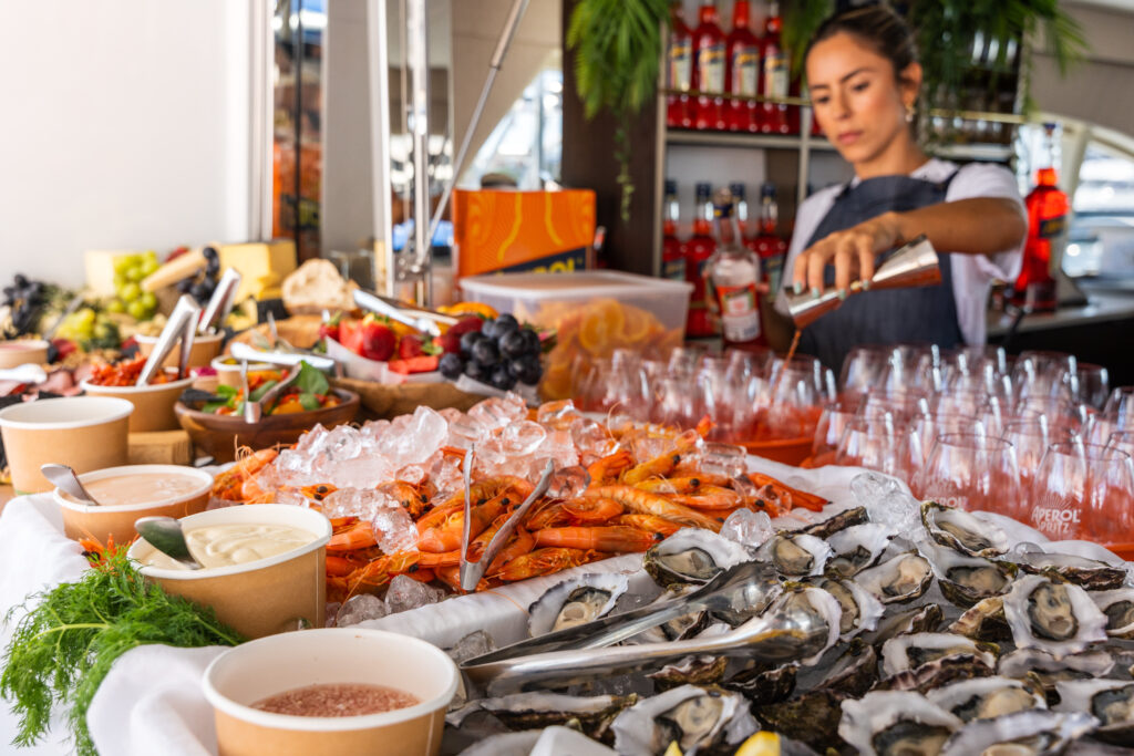 Casa Aperol x Justin Lane yacht food buffet including prawns and oysters