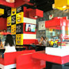A Lego themed restaurant in reds and yellows