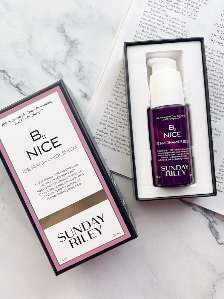 Sunday Riley b3 Nice Serum in box sitting on magazine page