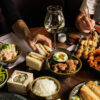 Spread of Japanese food on a table at Izakaya Publico