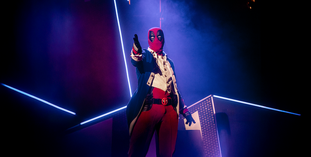 Samwise Holmes dressed as Deadpool dressed as Alexander Hamilton in Marvelous the risque parody