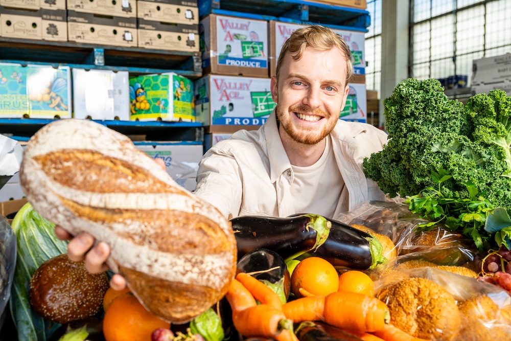 Quick Bites | Brisbane's best food news for July 6 Noah Pratt Funky Foods CEO celebrating the partneship with Sonoma Artisan Breads photo Darren Thomas 2