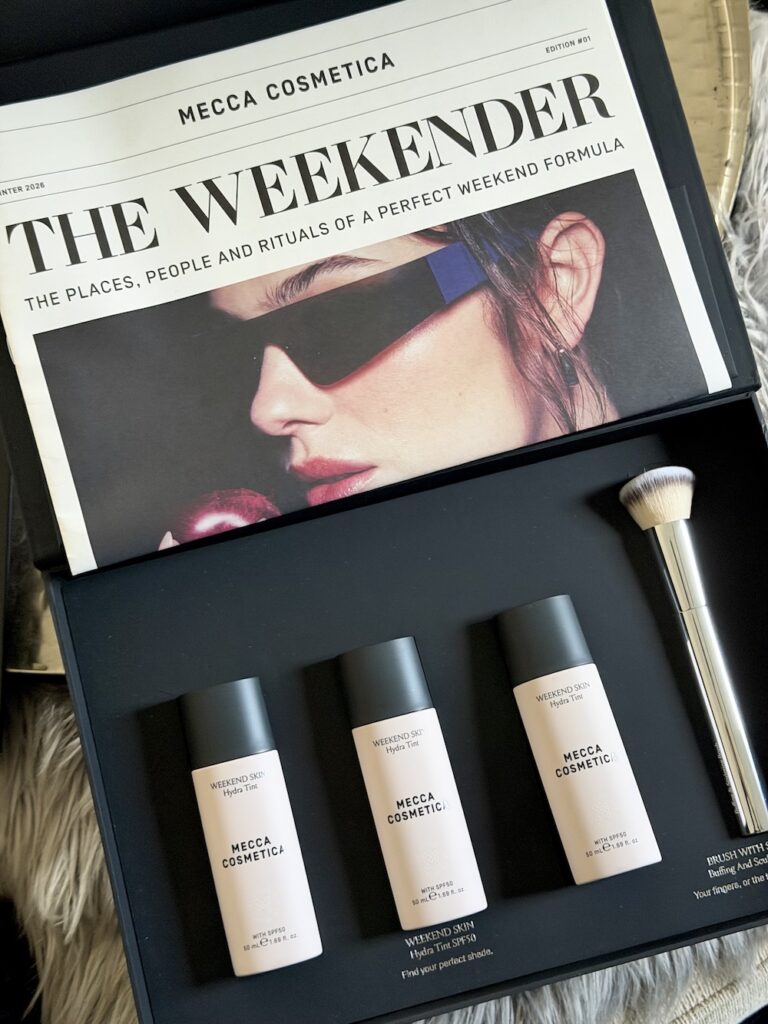MECCA Cosmetica's new no-makeup makeup product is the ultimate lazy girl hack 1 A black box featuring three of Mecca Cosmetica's Weekender Skin Hydra Tint and a newspaper that says The WEEKENDER